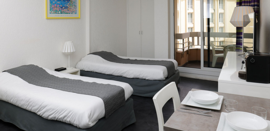 Studio côté ville avec balcon